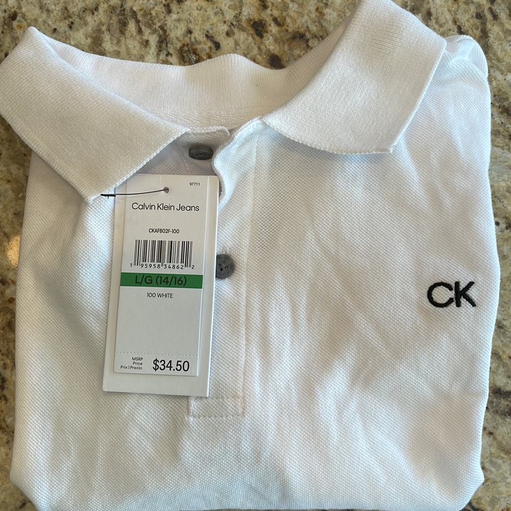 Calvin Klein polo shirt label to size 14/16 kids brand new with original…